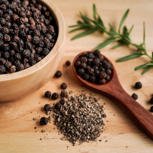 ConvertOut-Resized-black-pepper-cup-with-wood-grain-background-industry-concept_1024x1024